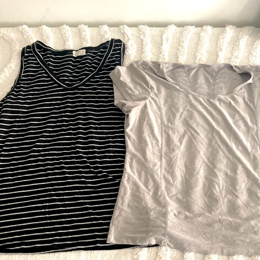 Two tops one is black-and-white and the other is all the gray
